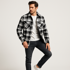 Man in plaid jacket with stylish fashion pose